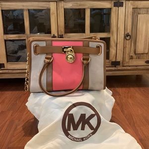 Michael Kors tote with couple of non-permanent marks on font,back,bottom, strap